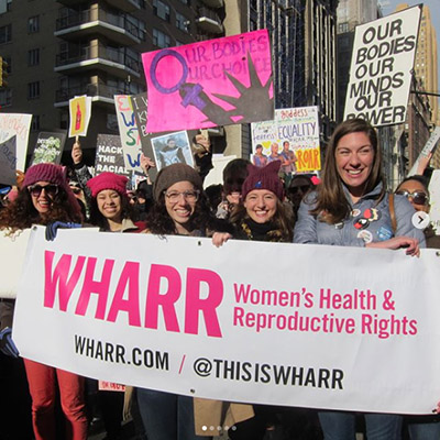 WHARR members protesting at Women's March